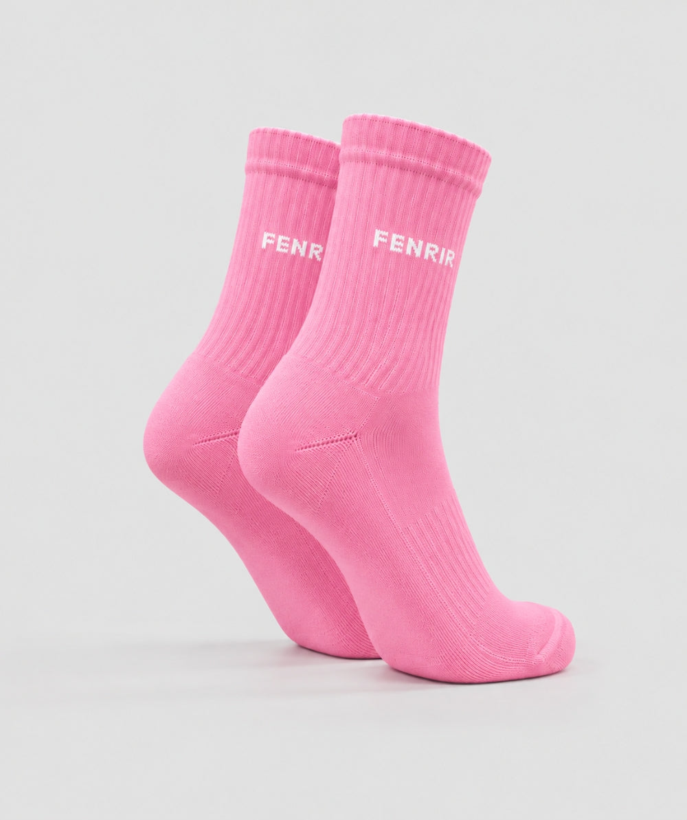 Medias deportivas Fenrir rosadas - detalle de caña media y logo